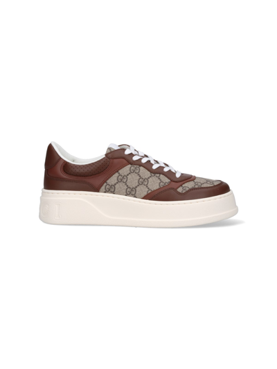 Shop Gucci "gg" Sneakers In Brown