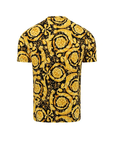 Shop Versace T-shirt In Gold