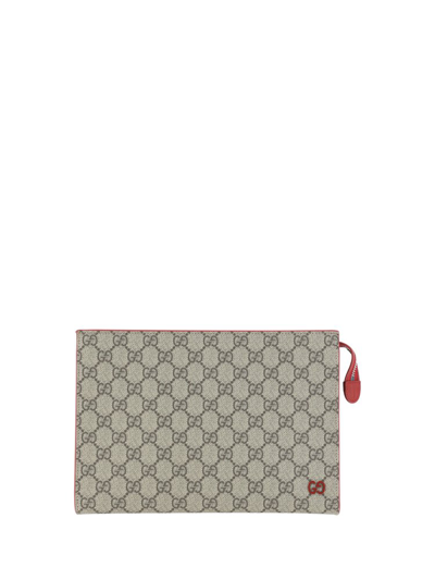 Shop Gucci Gg Detailed Zipped Clutch Bag In Beige