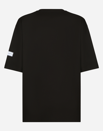 Shop Dolce & Gabbana Short-sleeved T-shirt With Dg Logo Patch In Black