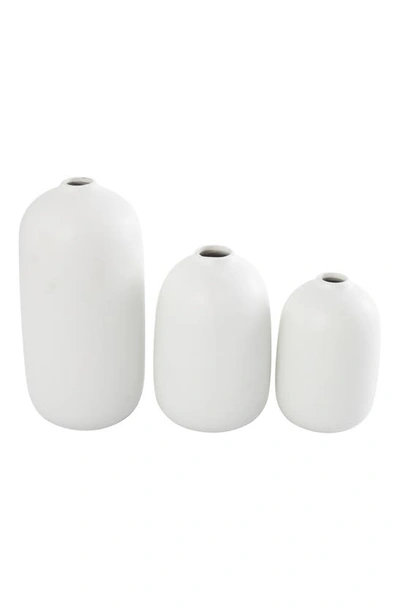 Shop Ginger Birch Studio Set Of 3 Botanical Ceramic Vases In White