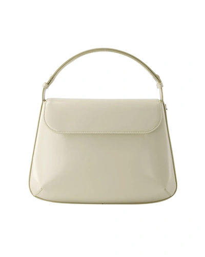 Shop Courrèges Sleek Medium Bag - Courreges - Leather - Beige In White