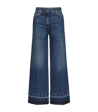 Shop Valentino Wide-fit Jeans In Blue