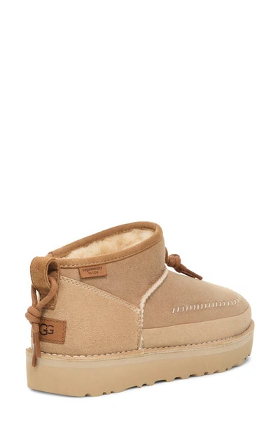 Shop Ugg Gender Inclusive Ultra Mini Crafted Regenerate Genuine Shearling Lined Bootie In Sand