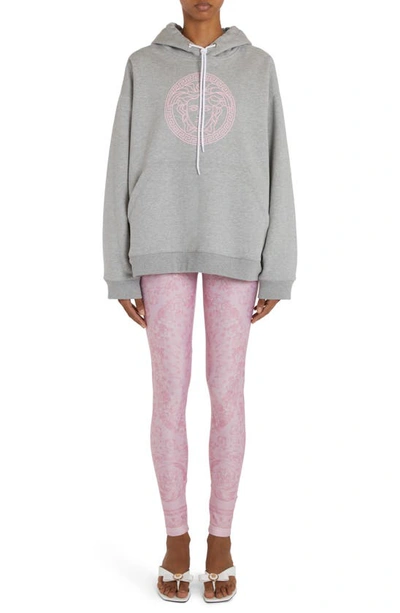 Shop Versace Oversize Medusa Logo Graphic Hoodie In Gray Melange/ Pale Pink