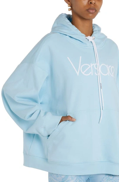 Shop Versace Oversize 1978 Re-edition Logo Embroidered Hoodie In Pale Blue/ Bianco