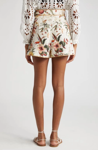 Shop Zimmermann Lexi Tropical Floral Belted Raffia Trim Linen Shorts In Ivory Palm