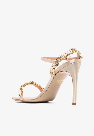 Shop Moschino 100 Mini Logo Lettering Leather Sandals In Gold