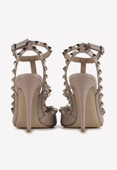 Shop Valentino 100 Rockstud Leather Pumps In Beige