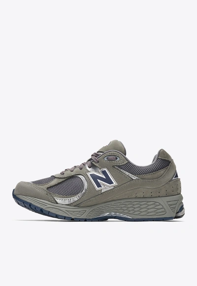 Shop New Balance 2002r Low-top Sneakers In Castlerock With Natural Indigo In Gray