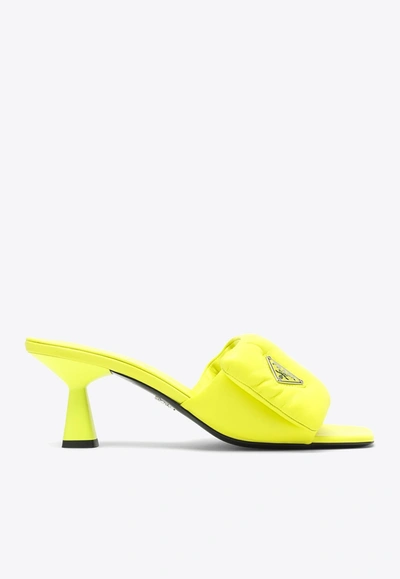 Shop Prada 65 Logo Padded Leather Mules In Yellow