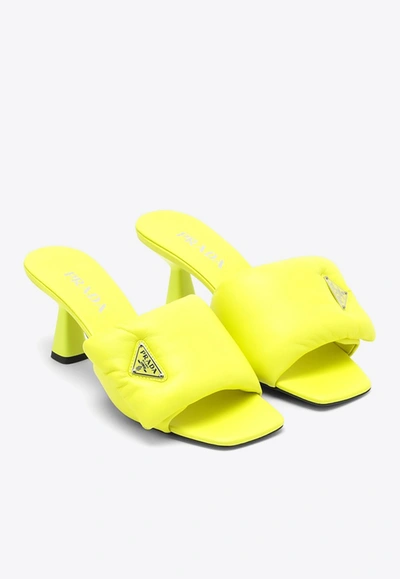 Shop Prada 65 Logo Padded Leather Mules In Yellow