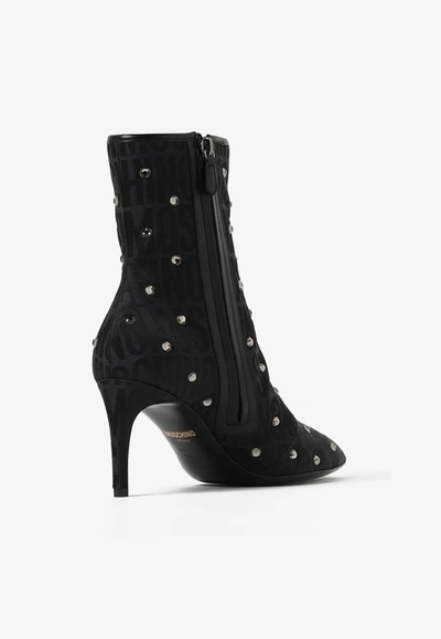 Shop Moschino 75 All-over Jacquard Logo Ankle Boots In Black