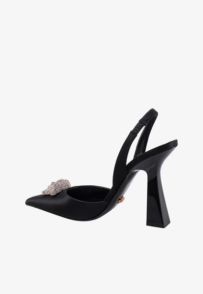 Shop Versace 80 Crystal Embellished Medusa Slingback Pumps In Satin In Black