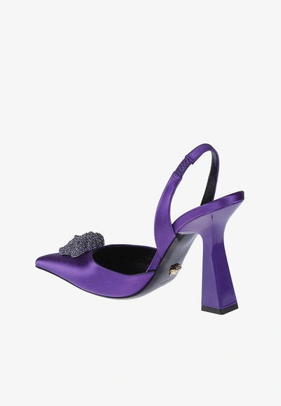 Shop Versace 80 Crystal Embellished Medusa Slingback Pumps In Satin In Purple