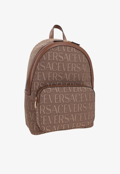 Versace All-over Logo Backpack In Beige