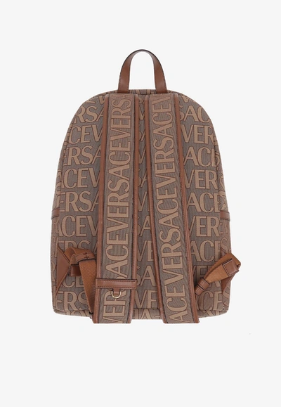 Versace All-over Logo Backpack In Beige