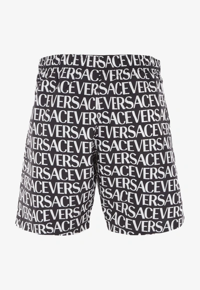 Versace All-over Logo Bermuda Shorts In Monochrome