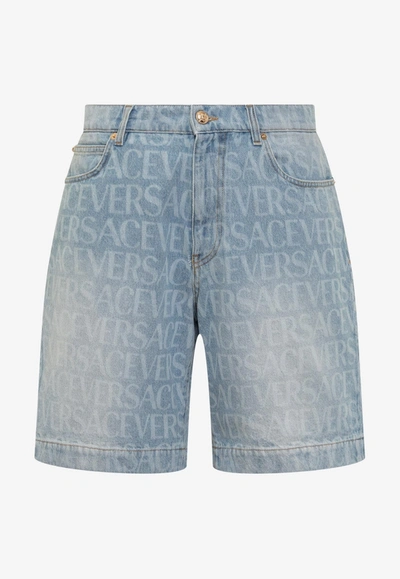 Shop Versace All-over Logo Denim Shorts In Blue