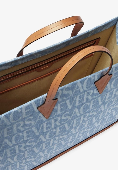 Shop Versace All-over Logo Denim Tote Bag In Blue