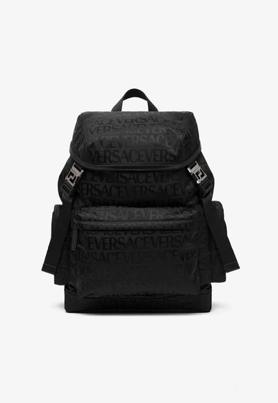 Shop Versace All-over Logo Jacquard Backpack In Black