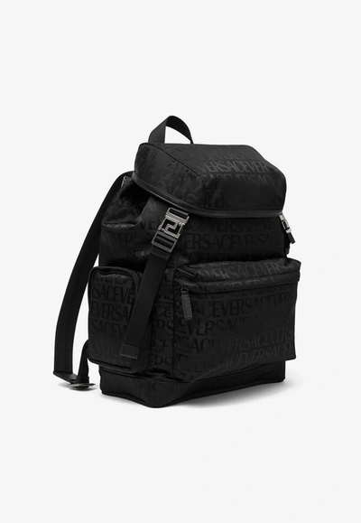 Versace All-over Logo Jacquard Backpack In Black