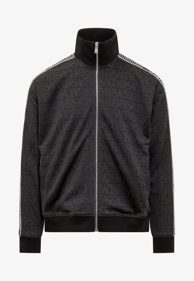 Shop Versace All-over Logo Jacquard Zip-up Sweatshirt In Black