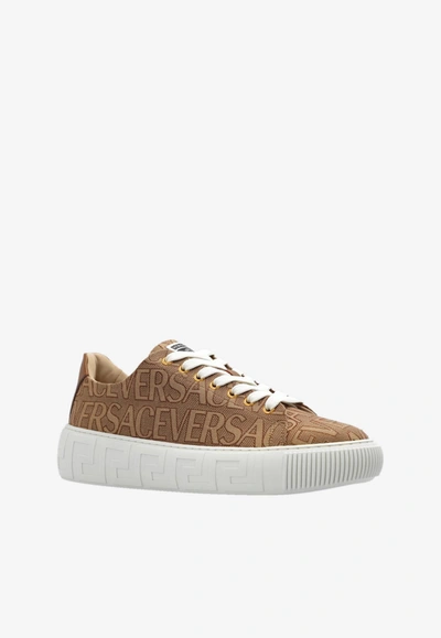 Shop Versace All-over Logo Low-top Sneakers In Brown