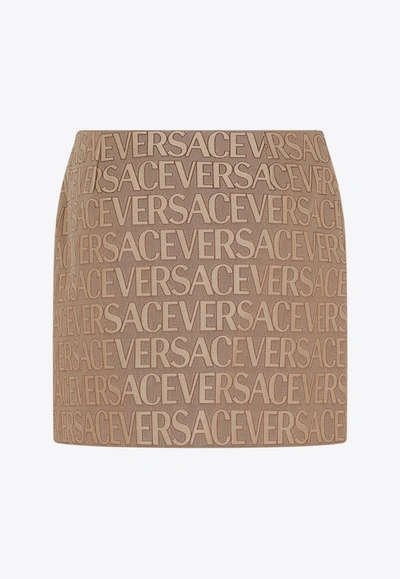 Shop Versace All-over Logo Mini Skirt In Brown