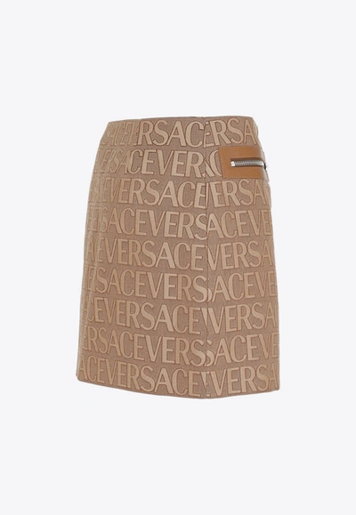 Shop Versace All-over Logo Mini Skirt In Brown