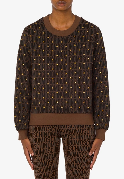 Shop Moschino All-over Logo Sweatshirt With Rhinestones In Brown