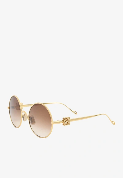 Shop Loewe Anagram Round Sunglasses In Brown