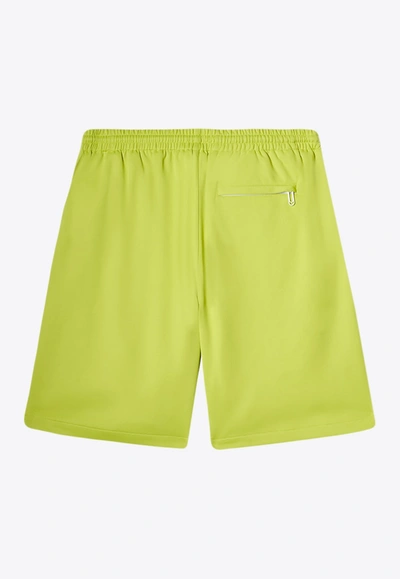 Shop Off-white Arrow Print Track Shorts In Lime