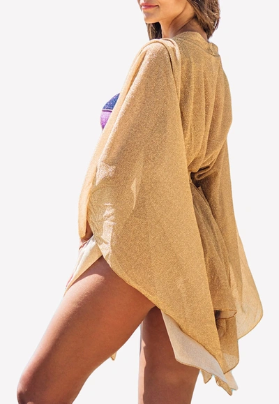 Shop Les Canebiers Asymmetric Poncho With Waist Belt In Gold