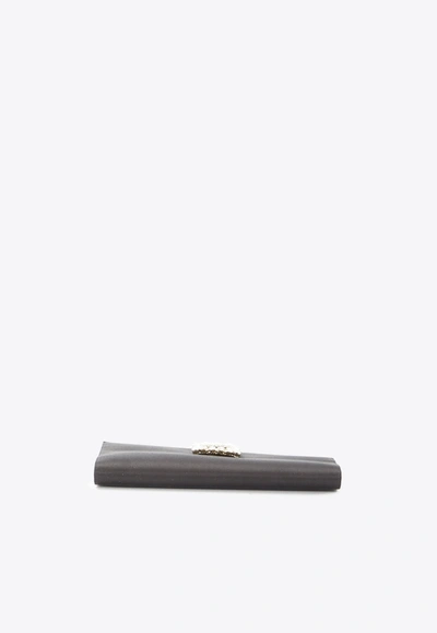 Roger Vivier Asymmetrical Crystal Buckle Satin Clutch In Black