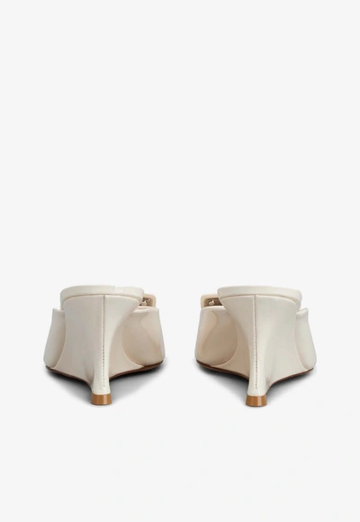 Shop Roger Vivier Belle Vivier 65 Lacquered Buckle Wedge Mules In Patent Leather In Off-white