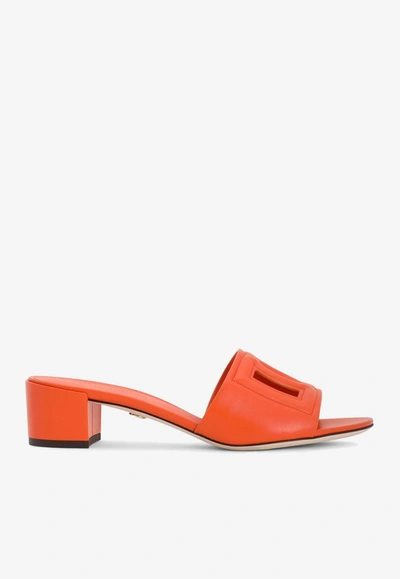 Shop Dolce & Gabbana Bianca 40 Mules With Dg Millennials Logo In Orange