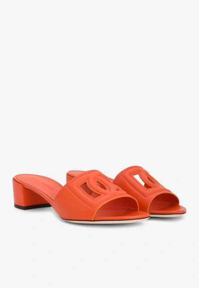 Shop Dolce & Gabbana Bianca 40 Mules With Dg Millennials Logo In Orange