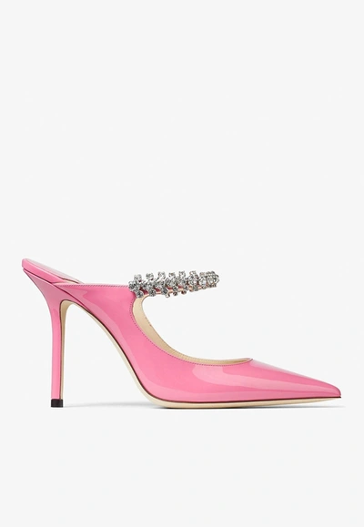 Shop Jimmy Choo Bing 100 Crystal-embellished Mules In Patent Leather In Candy
