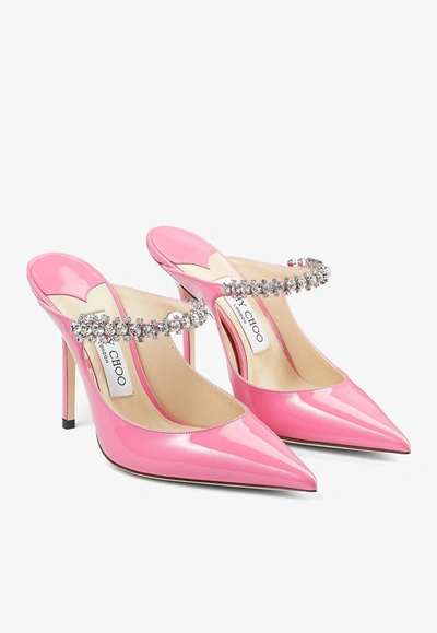 Shop Jimmy Choo Bing 100 Crystal-embellished Mules In Patent Leather In Candy