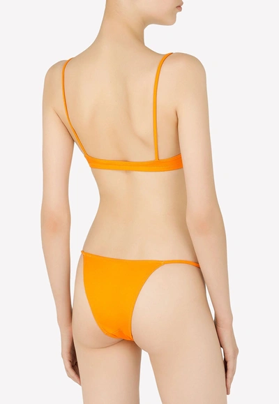 Shop Dolce & Gabbana Bralette Bikini With Metal Logo In Orange