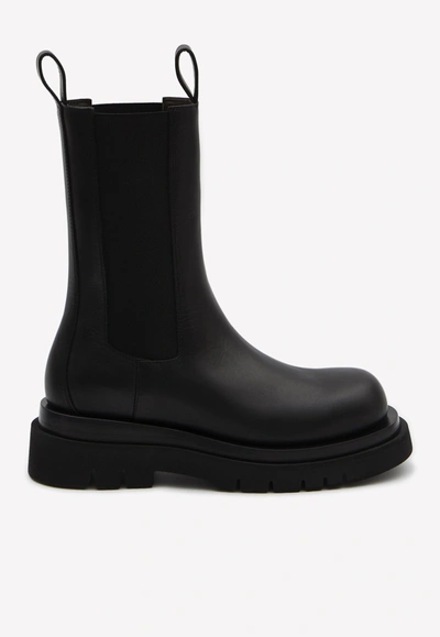 Shop Bottega Veneta Calfskin Lug Boots With Elasticated Side Panels In Black
