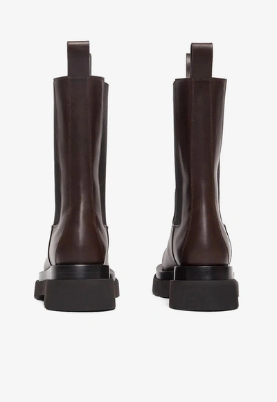 Shop Bottega Veneta Calfskin Lug Boots With Elasticated Side Panels In Fondant