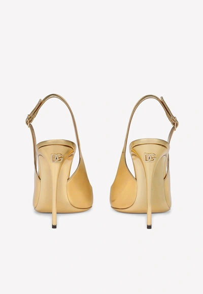 Shop Dolce & Gabbana Cardinale 105 Metallic Slingback Pumps In Calf Leather In Gold