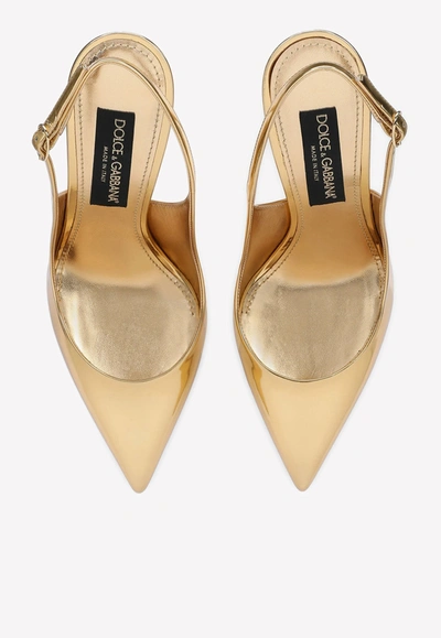 Shop Dolce & Gabbana Cardinale 105 Metallic Slingback Pumps In Calf Leather In Gold