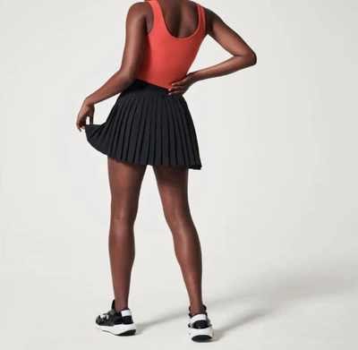 Shop Spanx The Get Moving Pleated Skort In Black