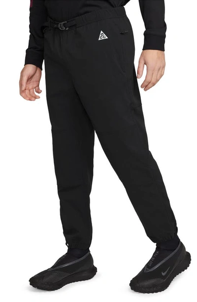 Shop Nike Acg Water Repellent Trail Pants In Black/ Anthracite/ White