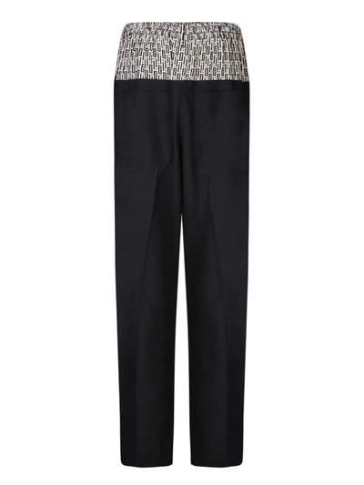 Shop Fendi Trousers In Black