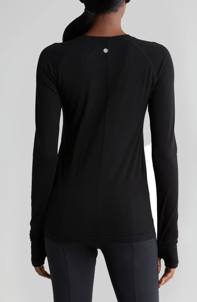 Shop Zella Seamless Long Sleeve Top In Black