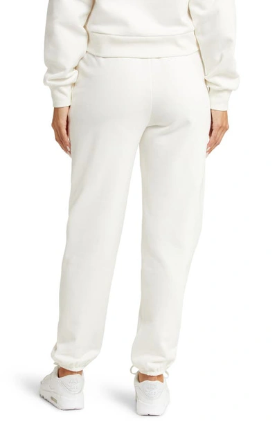 Shop Beyond Yoga On The Go Cotton Blend Joggers In Fresh Snow